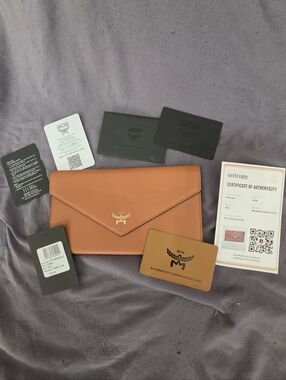 AUTHENTIC NWT  - MCM Cognac Envelope Wallet with Gold Logo